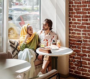 Friends in a window seat